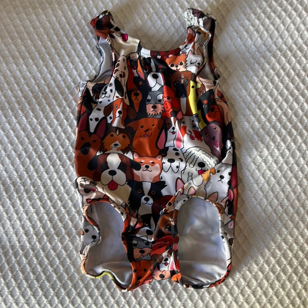 Cute dog gymnastics leotard, size 6.  Only a tiny amount of pilling/ barely worn